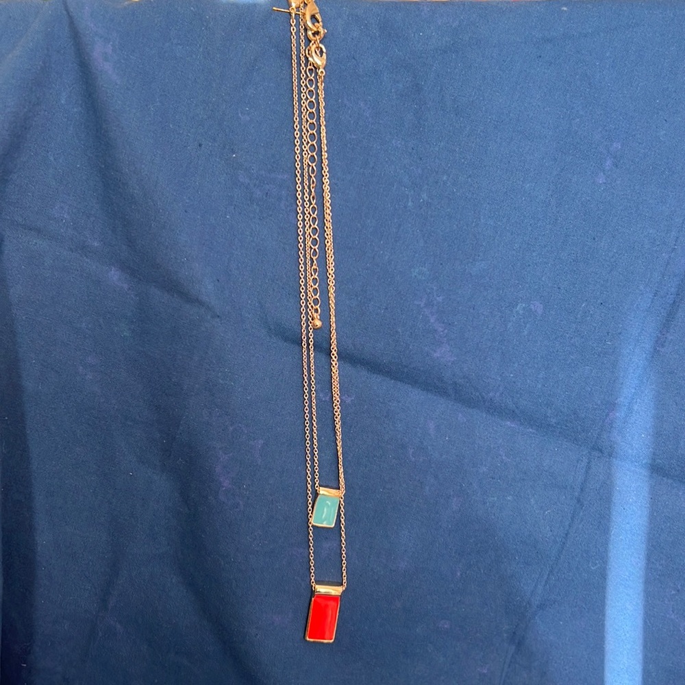 This elegant 2 layer necklace can be worn with only one pendant if desired.